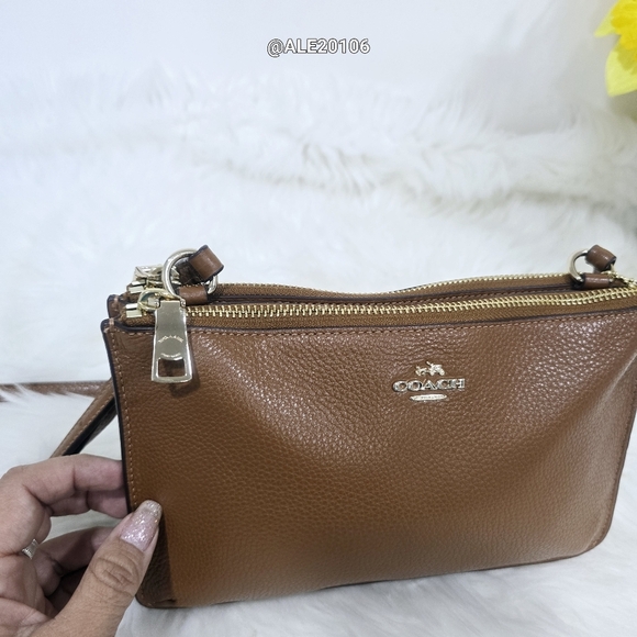 Coach signature brown crossbody with 2 zippers on top. - Picture 12 of 13